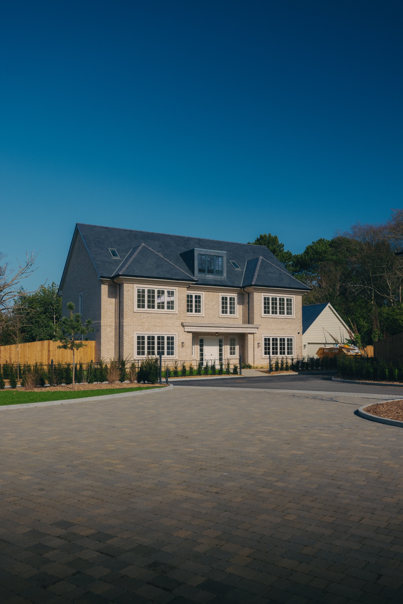 A completed home at Park View beside its newly finished driveway and planting