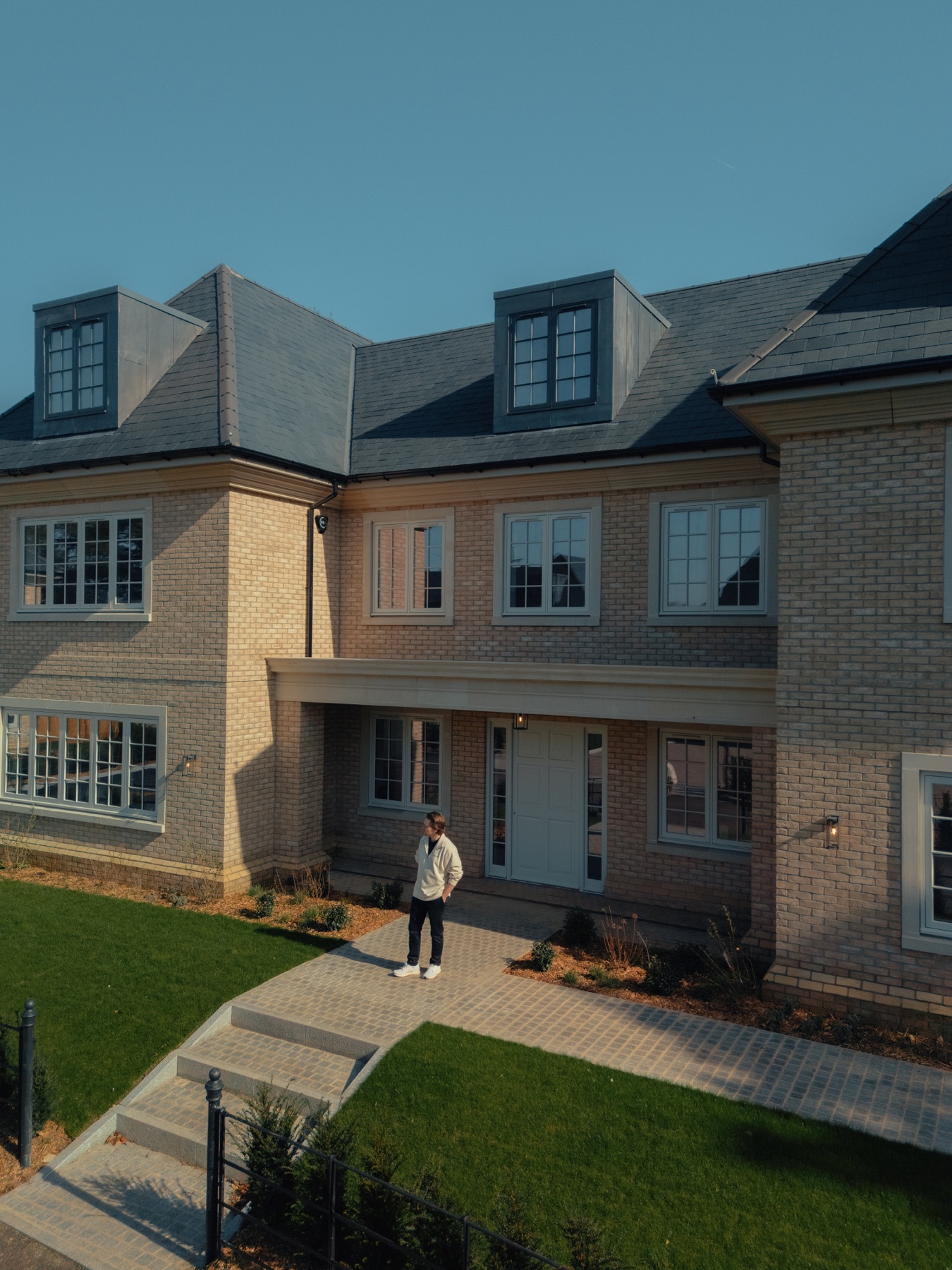 Paraded founder Matt Cuzen standing outside a completed home at Park View